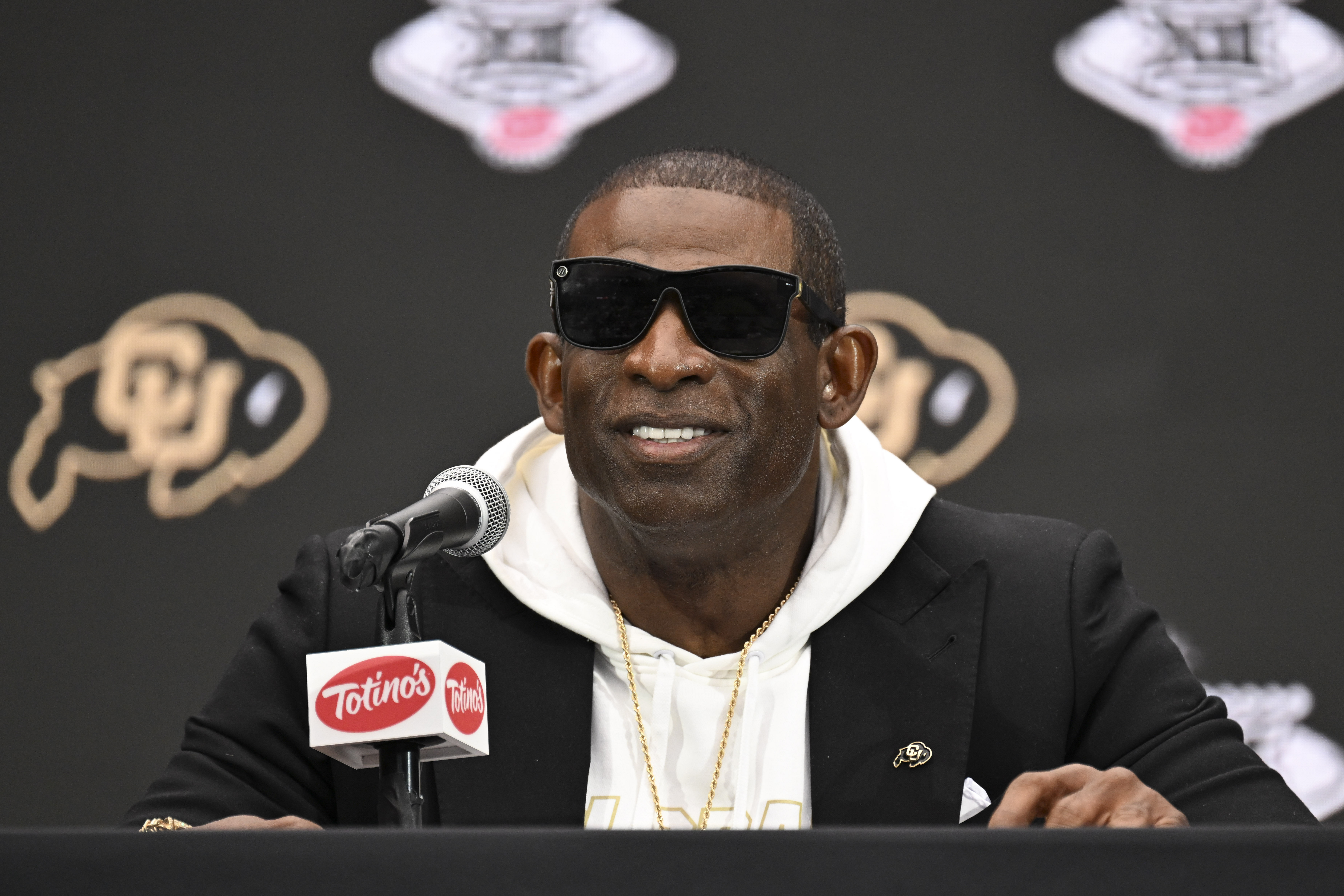 Colorado Buffaloes head coach Deion Sanders speaks to the media during the Big 12 Media Days — Source: Imagn
